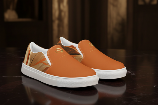 Chaitanya Abara women's slip-on canvas shoes in orange with gold abstract art print detail, white rubber sole — wearable art footwear
