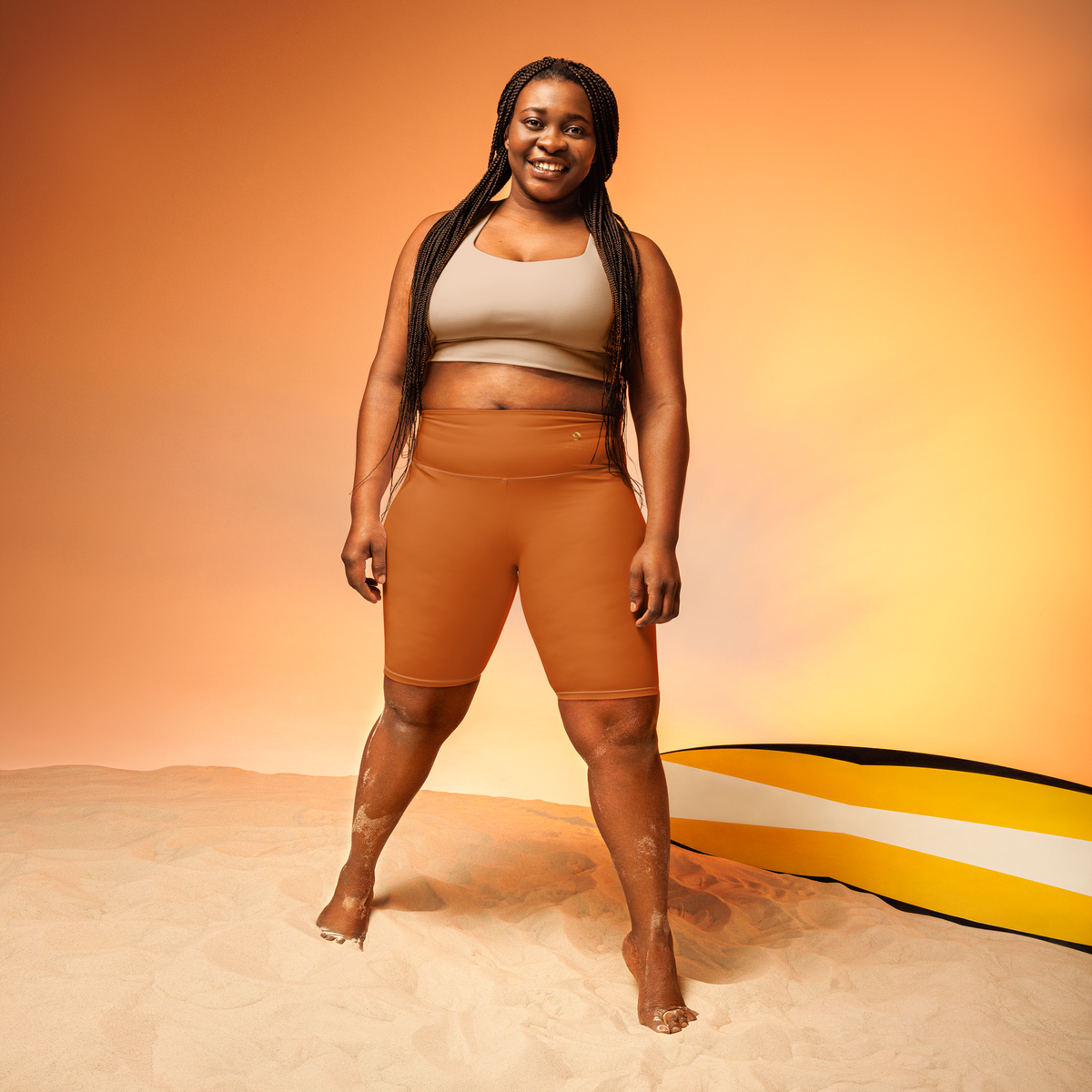 Plus size woman confidently wearing curve-fit biker shorts in sizes XS–3XL by Chaitanya Abara — Eternal Agape activewear