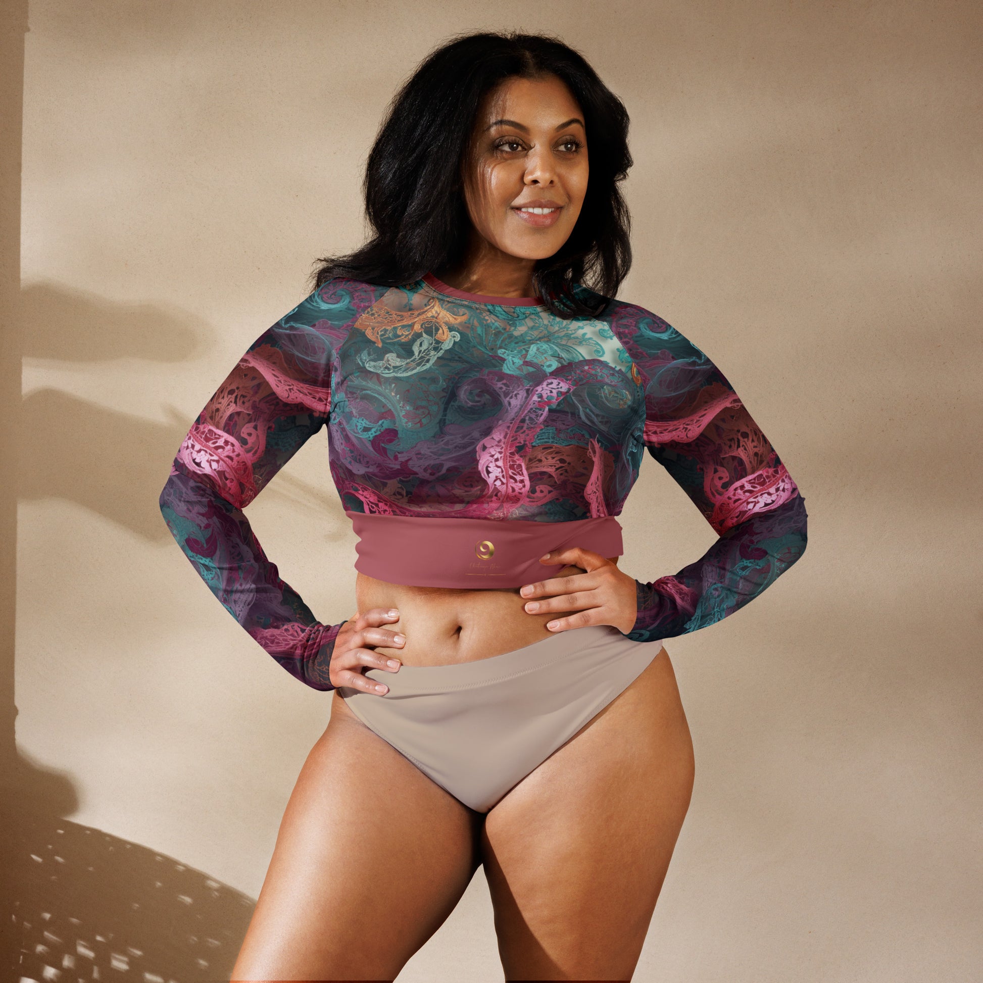 Chaitanya Abara Rangini Forme Recycled Long-Sleeve Crop Top — lace-woven fractal pattern in warm chromatic tones