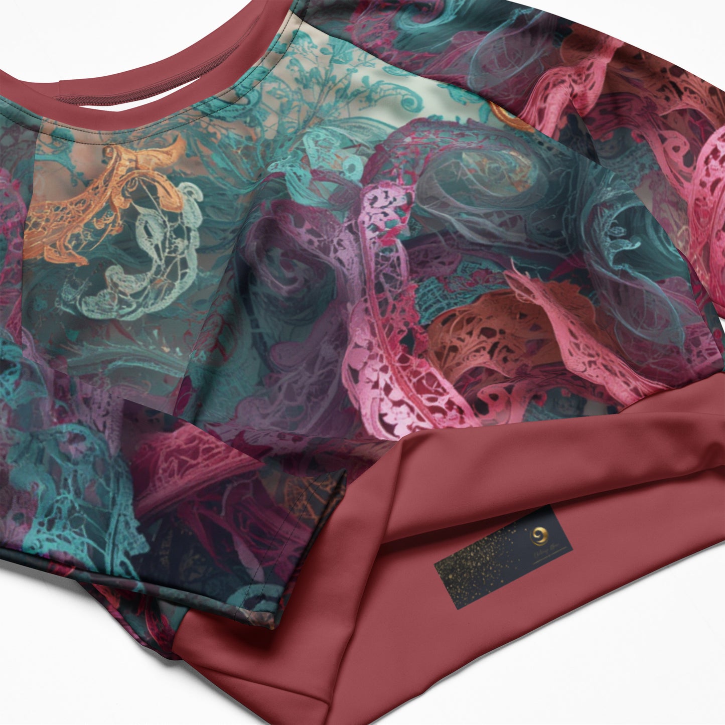 Chaitanya Abara Rangini Forme Recycled Long-Sleeve Crop Top — lace-woven fractal pattern in warm chromatic tones